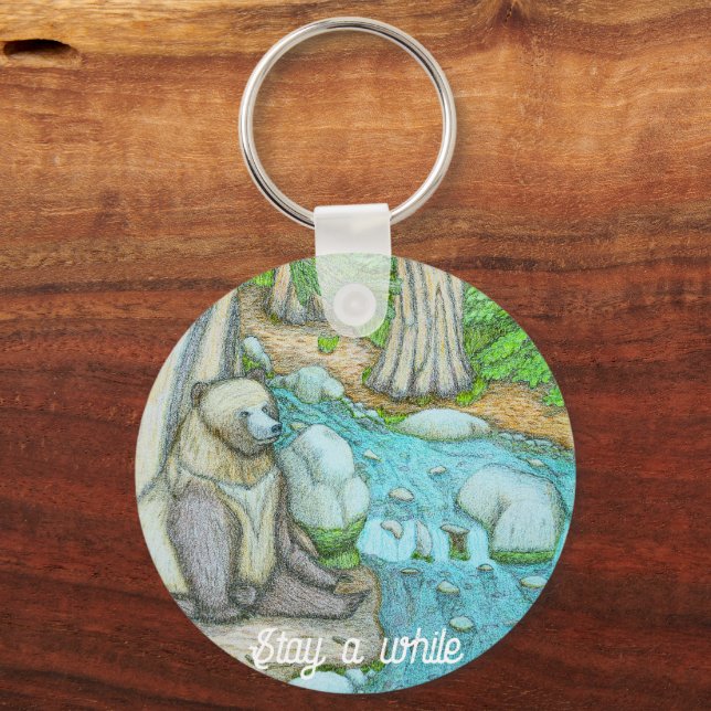 Bear sitting by a creek keychain (Front)