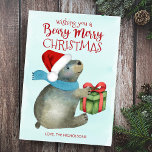Beary Merry Christmas Cute Bear Santa Hat Holiday Card<br><div class="desc">Cute,  fun forest friend themed holiday card features an ice blue watercolor wash background with a bear bundled up in a scarf and Santa hat getting ready to open a Christmas present.  Reverse side is wintery midnight blue with white snowflakes pattern. Personalize with your name(s). Original artwork KL Stock.</div>