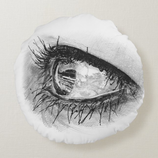 Beau oeil de femme en mascara sur coussin rond (Dos)