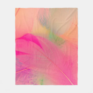 Beautiful abstract purple and blue feathers on whi fleece blanket