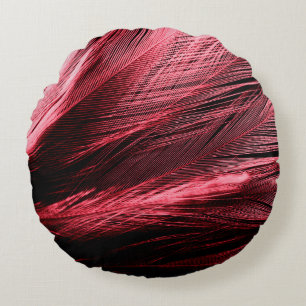 Beautiful abstract red feathers on dark background round pillow