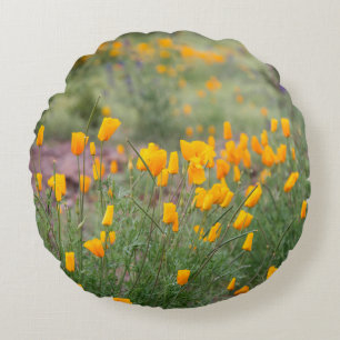 beautiful and fragrant wildflowers growing in tucs round pillow