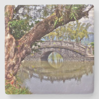 BEAUTIFUL ARCHED STONE BRIDGE REFLECTED IN POND