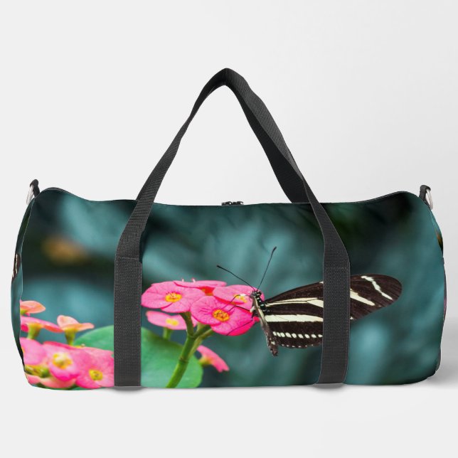 Beautiful butterfly on a pink flower duffle bag (Front)