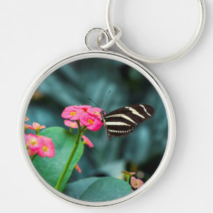 Beautiful butterfly on a pink flower keychain
