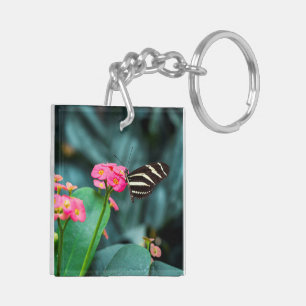 Beautiful butterfly on a pink flower keychain