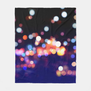 Beautiful city night bokeh light, abstract blur de fleece blanket