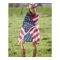 Beautiful cowgirl wrapped in American flag