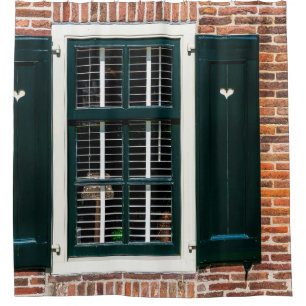 Beautiful dutch traditional houses. Brick wall wit