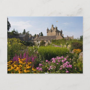 Beautiful gardens and famous castle in postcard
