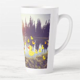 Beautiful lake in the sunrise with plastic dack latte mug