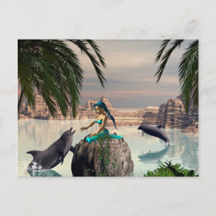 Beautiful mermaid sitting on a rock postcard