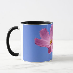 beautiful pink flowers hugging a clear blue sky mug