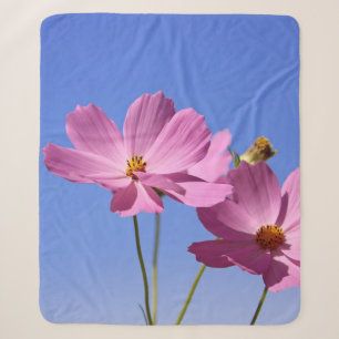 beautiful pink flowers hugging a clear blue sky sherpa blanket