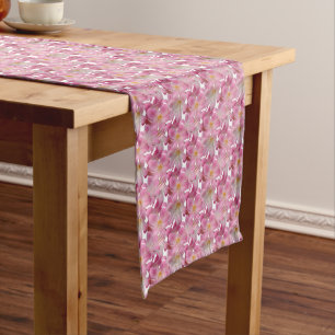 Beautiful pink flowers on white medium table runner