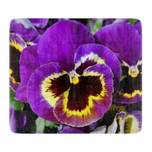 Beautiful purple pansy flower cutting board