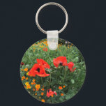 Beautiful Red Poppy Keychain<br><div class="desc">This colourful photograph was taken on a visit to a Kentish Garden. I love red poppies, and was delighted to find these extra large ones growing in one of the flower beds. They totally dwarfed the orange Icelandic poppies growing amongst them. It would make a lovely gift for a flower...</div>