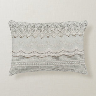 Beautiful, subtle, white laced textile close up.  accent pillow