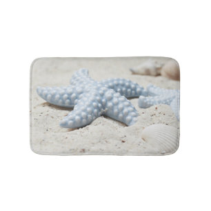 Beautiful summer beach sea star shell and sand bath mat