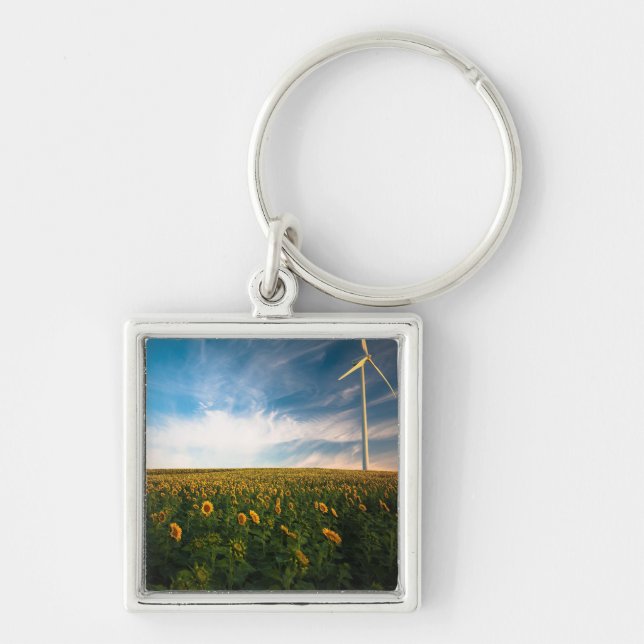 beautiful sun flowers field with cloudy blue sky a keychain (Front)