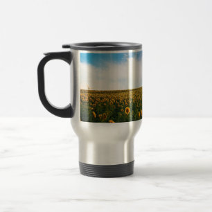 beautiful sun flowers field with cloudy blue sky a travel mug