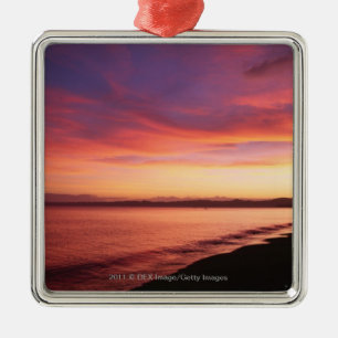 Beautiful sunset at the beach metal ornament