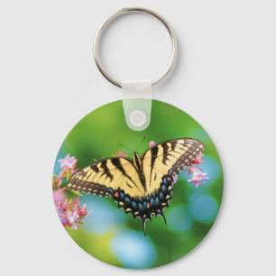 Beautiful Swallowtail butterfly on pretty flowers  Keychain