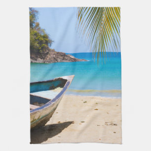 Beautiful Tropical Beach with a Rowboat Kitchen Towel