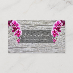 Beautiful violet pink orchid blossoms on wood business card