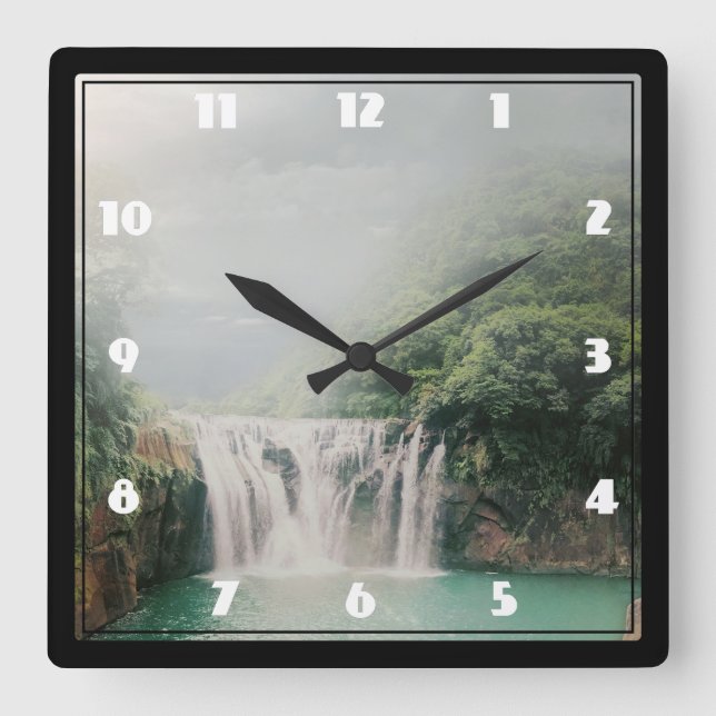 Beautiful Waterfall in a Lush Green Forest Square Wall Clock (Front)