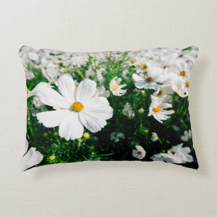 Beautiful white cosmos flowers blooming in gardena accent pillow