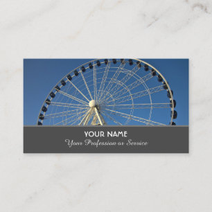 Beautiful white ferris wheel infront of blue sky b business card