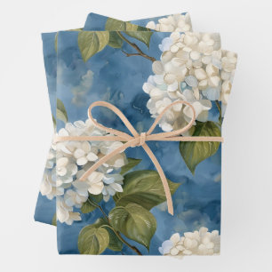 Beautiful white hydrangea on blue wrapping paper sheet