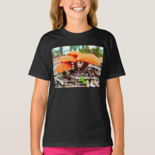 Beautiful wild mushrooms bunch in an autumn field T-Shirt