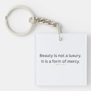 Beauty is Not a Luxury, It is a Form of Mercy Keychain