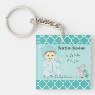 Bébé bébé garçon en bleu avec fleurs