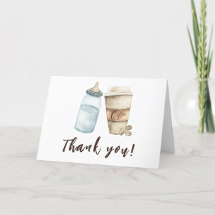 Bébé prépare une bouteille de café Merci