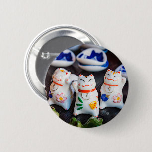 Beckoning cat figurines 2 inch round button