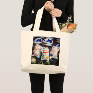 Beckoning cat figurines large tote bag