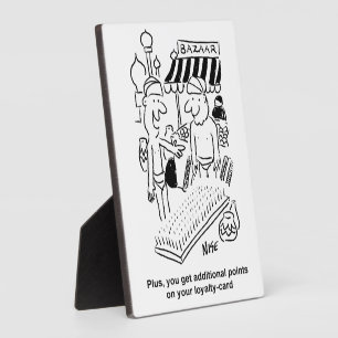 Bed of Nails at a Bazaar Cartoon Plaque