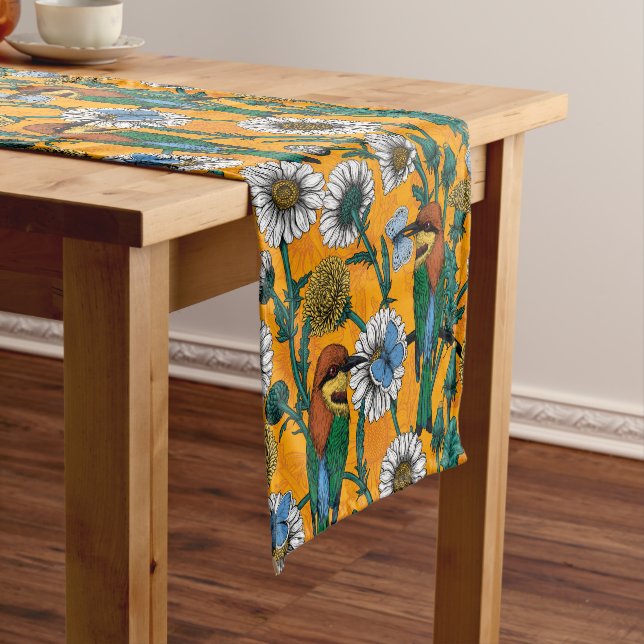 Bee-eaters, blue butterflies and daisies on orange short table runner (In Situ)