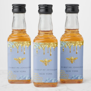 bee logo and blue hydrangea liquor bottle label