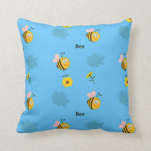 Bee pattern on blue throw pillow