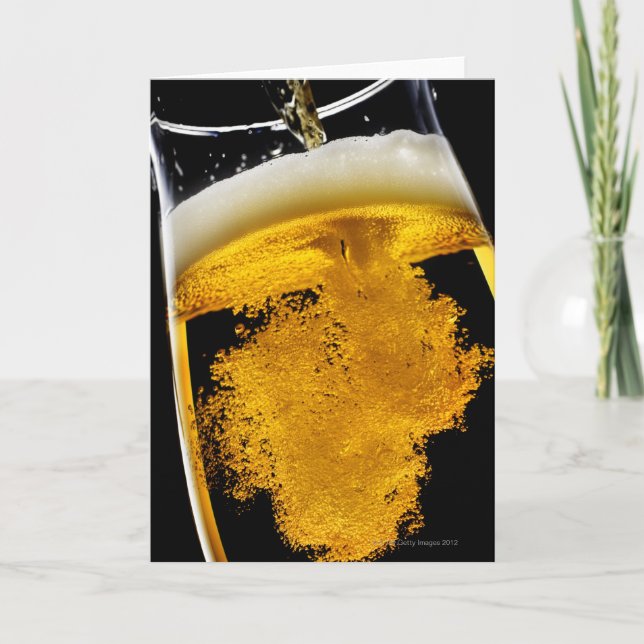 Beer been poured into glass, studio shot card (Front)