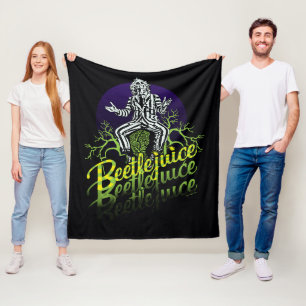 Beetlejuice Sitting on a Tombstone Fleece Blanket