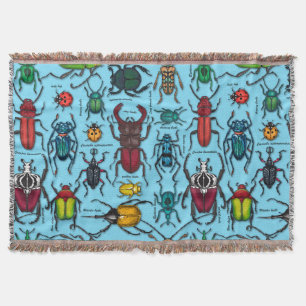 Beetles on blue throw blanket