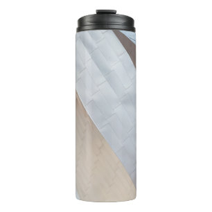 Beige and white surface thermal tumbler