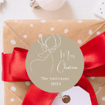 Beige white abstract reindeer modern Christmas Classic Round Sticker<br><div class="desc">A beige background,  and a white abstract one line reindeer.  Personalize and add a name and year. Text: Merry Christmas</div>