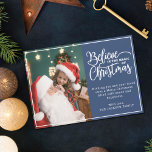 Believe in Christmas magic 2 family photos blue Holiday Card<br><div class="desc">Modern holiday greeting card featuring one of your favourite Christmas family portraits on the left complemented by the words "Believe in the magic of Christmas" on the right over a festive blue background, customizable with your own greeting message. You can upload one more picture on the reverse of the card....</div>