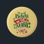 Believe in the Magic Christmas Typography 2 Inch Round Button<br><div class="desc">A button with a cool illustration. Text says Believe in the Magic in fancy lettering. Decorated with christmas balls.</div>